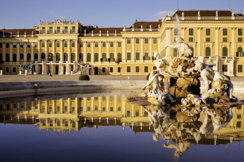 Schönbrunn Palace reflected in a fountain